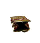 A small rectangular clutch or compact-style case with a gold-tone metal frame and clasp, shown open on a plain light gray studio background. The exterior has an ornate marbled pattern in gold, burgundy red, and light blue, while the interior is black.